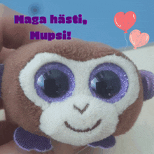 a stuffed animal with purple eyes and the words maga hästi mupsi