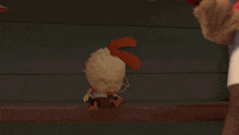 a cartoon character is wearing a shirt that says ' corn 's ' on it