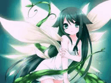 a cute anime girl with long green hair and white wings is sitting on a plant .