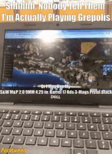 a dell laptop with a screen that says shhhh nobody tell them i 'm actually playing greopolis