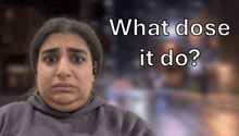 a woman with a sad look on her face and the words what dose it do