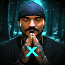 a man with his eyes closed has a blue x in front of his hands