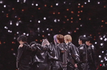 a group of people standing in a circle with their arms around each other with the number 8 visible in the corner