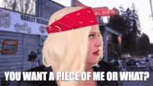 a woman wearing a red bandana says " you want a piece of me or what ? "