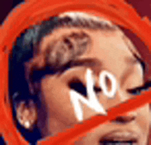 a close up of a woman 's face with a red circle around it and the word no written on her face .