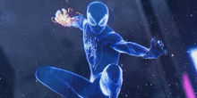 a close up of a person in a blue spiderman suit .