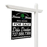 a forever florida real estate for sale sign with a palm tree on it