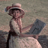 a woman in a white dress and hat is holding a drawing of a horse