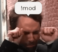 a man in a suit is crying with a speech bubble above his head that says ` ` i mod ` ` .