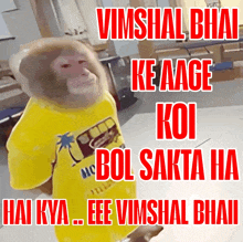 a monkey wearing a yellow shirt with the words vimshal bhai ke aage koi bol sakta hai