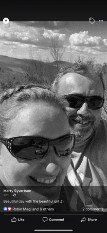 a black and white photo of a man and a woman taken by marty syvertson