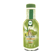 a bottle of aloe noni juice is sitting on a table .