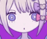 a close up of a cartoon girl 's face with purple hair and a bow in her hair .