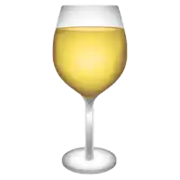 a white wine glass with a yellow liquid in it on a white background