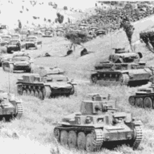 a black and white photo of a bunch of tanks