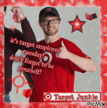 a man giving a thumbs up in a red shirt that says " it 's target employee tuesday "