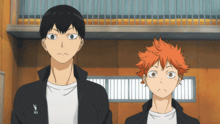 two anime characters standing next to each other with one wearing a jacket that says ics on it