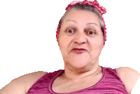 an elderly woman wearing a purple tank top and a red headband