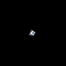 a square with a hole in the middle on a black background