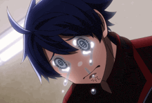 a close up of a person 's face with tears running down their face