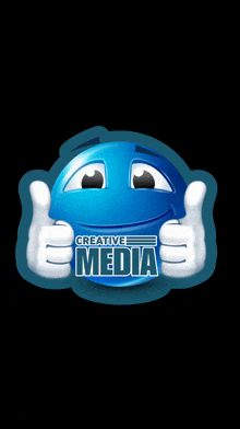 a blue smiley face that says creative media