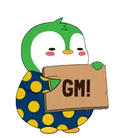 a penguin holding a sign that says gm