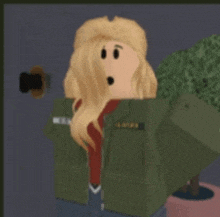 a girl in a green jacket with a surprised look on her face is standing in front of a door .