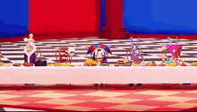 a table with a bunch of toys on it including a jester