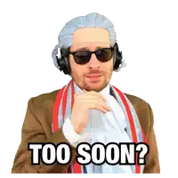 a man wearing a wig and sunglasses has the words too soon on his face