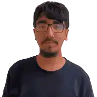 a man wearing glasses is making a funny face