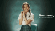 a girl in a white shirt and plaid skirt with the name namneung on the bottom