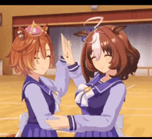 a couple of anime girls are giving each other a high five