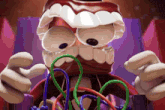 a cartoon character is holding a bunch of colorful ropes in his mouth
