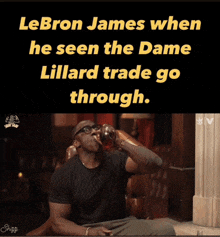 a man drinking from a glass with the words lebron james when he seen the dame lillard trade go through below him