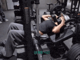 a man is doing exercises on a machine with a number 10 on it