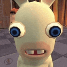 a cartoon rabbit with big blue eyes and teeth is looking at the camera in a video game .
