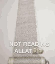 a scroll with the words `` not reading allat '' written on it