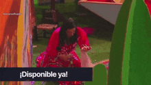 a woman in a red dress is kneeling down in front of a sign that says " disponible ya "