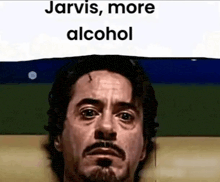 a close up of a man 's face with the words `` jarvis , more alcohol '' written above it .