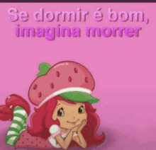 a cartoon of strawberry shortcake laying down on a pink surface