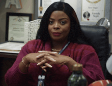 a woman with a lanyard around her neck that says kansas night on it