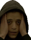 a man in a hoodie is covering his face with his hands .