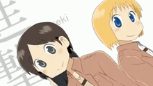 two anime characters are standing next to each other with the word " eki " in the corner