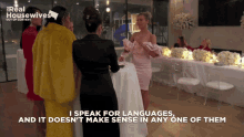 a group of women are standing in front of a table with the words " i speak for languages "