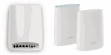 two white orbi routers sitting next to each other on a white background