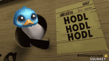 a picture of a penguin and a piece of paper that says hodl