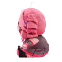 a pink stuffed animal with a purple headband that says hatsune on it