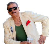 a man wearing sunglasses and a white jacket holds a drink