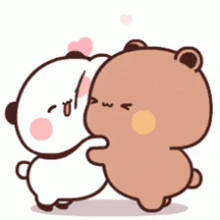 a couple of bears are hugging each other .