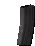 a black object is sitting on a white surface .